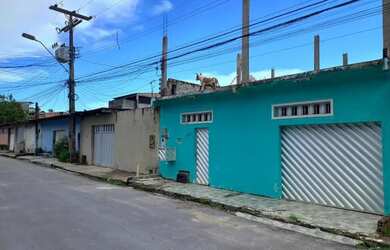 Imagem: A casa possui 2 Dormitórios, 1 Banheiro, 3 Vagas na garagem