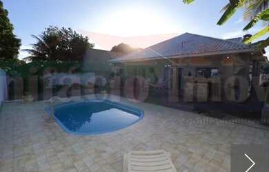 Imagem: A casa possui 4 Dormitórios, 3 Banheiros, 3 Vagas na garagem