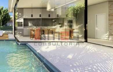 Imagem: A casa possui 3 Dormitórios, 4 Banheiros, 2 Vagas na garagem