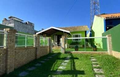 Imagem: A casa possui 2 Dormitórios, 1 Banheiro, 3 Vagas na garagem