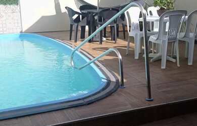 Imagem: A casa possui 4 Dormitórios, 4 Banheiros, 2 Vagas na garagem