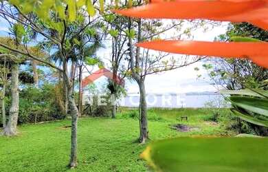 Imagem: A casa possui 3 Dormitórios, 3 Banheiros, 2 Vagas na garagem