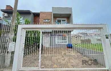 Imagem 3: Casa em Porto Alegre, no bairro Hípica, com 3 dormitório s , e 3 banheiros,...