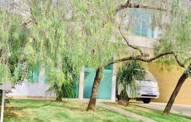 Imagem: A casa em condomínio possui 4 Dormitórios, 5 Banheiros, 4