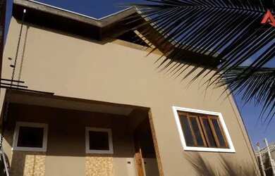 Imagem: A casa possui 4 Dormitórios, 5 Banheiros, 4 Vagas na garagem