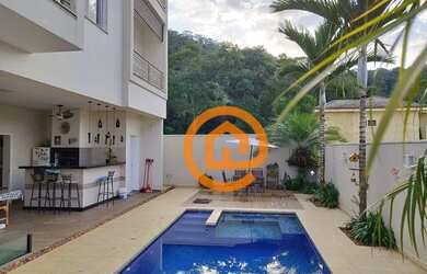 Imagem: A casa em condomínio possui 4 Dormitórios, 3 Banheiros, 4