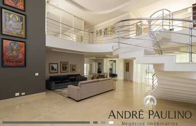 Imagem: A casa em condomínio possui 5 Dormitórios, 4 Banheiros, 619m²