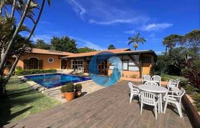 Imagem: A casa em condomínio possui 5 Dormitórios, 5 Banheiros, 5