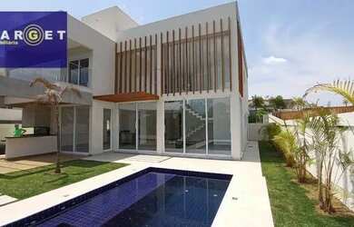 Imagem: A casa em condomínio possui 4 Dormitórios, 5 Banheiros, 5