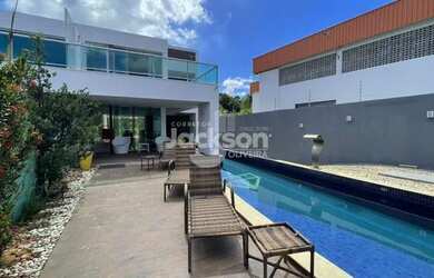 Imagem: A casa possui 3 Dormitórios, 5 Banheiros, 5 Vagas na garagem