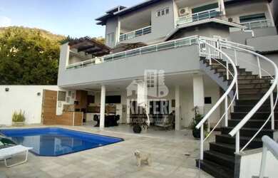 Imagem: A casa em condomínio possui 5 Dormitórios, 5 Banheiros, 4