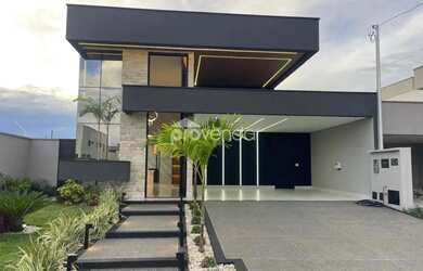 Imagem: A casa possui 3 Dormitórios, 4 Banheiros, 4 Vagas na garagem