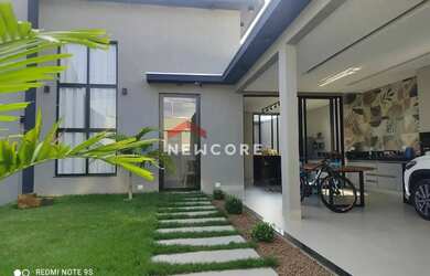 Imagem: A casa possui 3 Dormitórios, 3 Banheiros, 2 Vagas na garagem