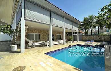 Imagem: A casa em condomínio possui 4 Dormitórios, 5 Banheiros, 5