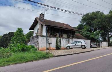 Imagem: A casa para alugar possui 4 Dormitórios, 4 Banheiros, 5 Vagas