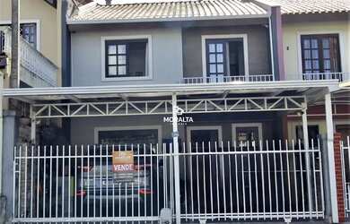 Imagem: A casa possui 3 Dormitórios, 2 Banheiros, 2 Vagas na garagem