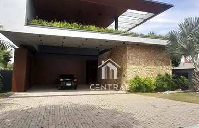 Imagem: A casa em condomínio possui 5 Dormitórios, 5 Banheiros, 4