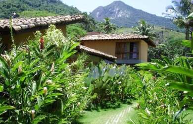 Imagem: A casa em condomínio possui 3 Dormitórios, 2 Banheiros, 2