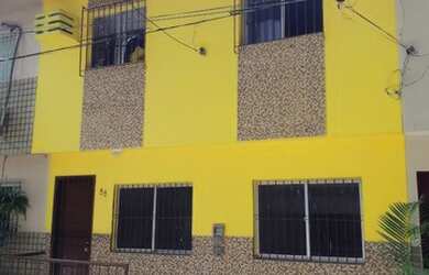 Imagem: A casa possui 3 Dormitórios, 2 Banheiros, 2 Vagas na garagem