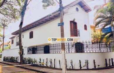 Imagem: A casa possui 3 Dormitórios, 5 Banheiros, 3 Vagas na garagem