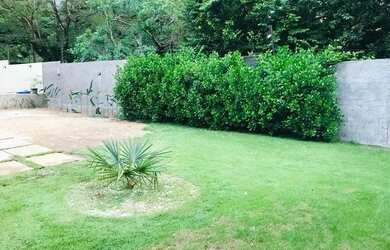 Imagem: A casa possui 3 Dormitórios, 2 Banheiros, 4 Vagas na garagem