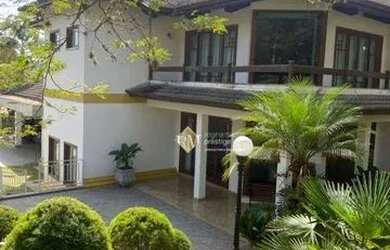 Imagem: A casa possui 5 Dormitórios, 5 Banheiros, 5 Vagas na garagem