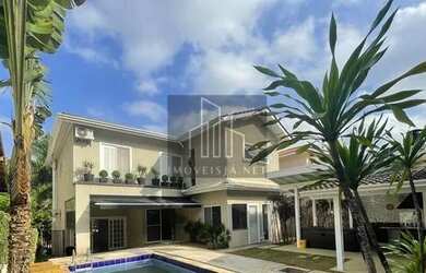 Imagem: A casa em condomínio possui 4 Dormitórios, 4 Banheiros, 4