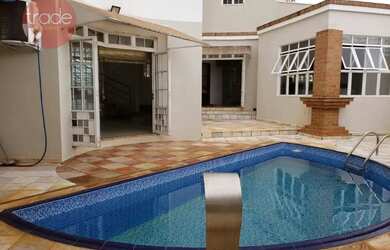 Imagem: A casa possui 3 Dormitórios, 5 Banheiros, 4 Vagas na garagem