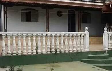 Imagem: A casa possui 5 Dormitórios, 3 Banheiros, 5 Vagas na garagem