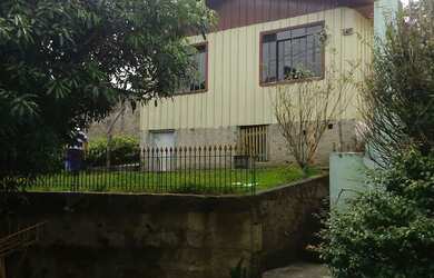 Imagem: A casa possui 3 Dormitórios, 1 Banheiro, 1 Vaga na garagem