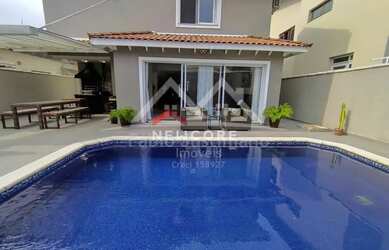 Imagem: A casa em condomínio possui 4 Dormitórios, 5 Banheiros, 4