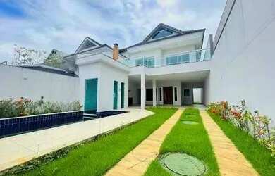 Imagem: A casa em condomínio possui 5 Dormitórios, 5 Banheiros, 2