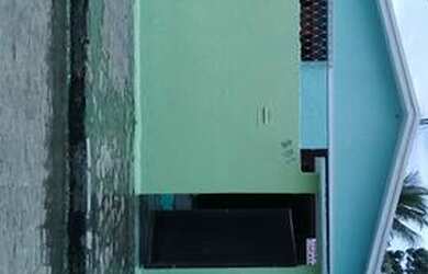 Imagem: A casa possui 2 Dormitórios e está localizado em Alto da Boa