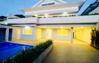 Imagem: A casa em condomínio à venda possui 4 Dormitórios, 5 Banheiros