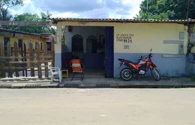 Imagem: A casa possui 2 Dormitórios, 2 Banheiros, 3 Vagas na garagem