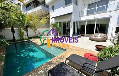 Imagem: A casa em condomínio possui 4 Dormitórios, 5 Banheiros, 4