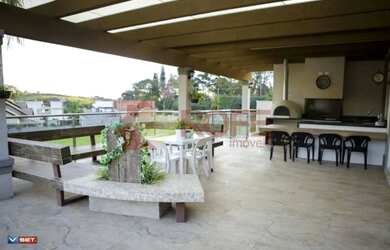 Imagem: A casa em condomínio possui 5 Dormitórios, 5 Banheiros, 3