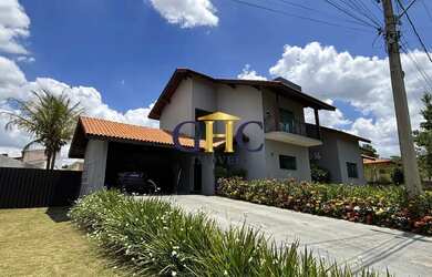 Imagem: A casa possui 5 Dormitórios, 5 Banheiros, 5 Vagas na garagem