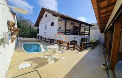 Imagem: A casa em condomínio possui 4 Dormitórios, 5 Banheiros, 4