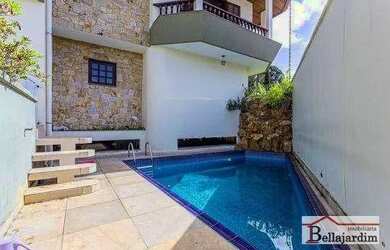 Imagem: A casa possui 3 Dormitórios, 5 Banheiros, 5 Vagas na garagem