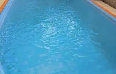 Imagem: A casa possui 4 Dormitórios, 4 Banheiros, 4 Vagas na garagem