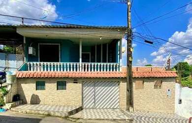 Imagem: A casa possui 3 Dormitórios, 3 Banheiros, 2 Vagas na garagem