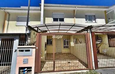 Imagem: A casa possui 2 Dormitórios, 1 Banheiro, 1 Vaga na garagem