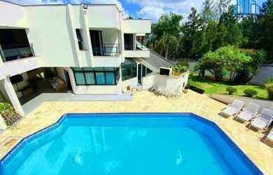 Imagem: A casa em condomínio possui 5 Dormitórios, 5 Banheiros, 5