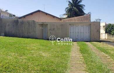 Imagem: A casa possui 3 Dormitórios, 2 Banheiros, 5 Vagas na garagem