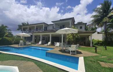 Imagem: A casa em condomínio possui 5 Dormitórios, 5 Banheiros, 5