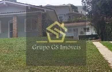 Imagem: A casa possui 4 Dormitórios, 4 Banheiros, 5 Vagas na garagem