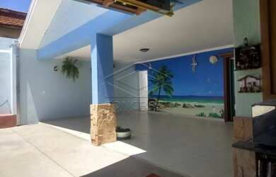 Imagem: A casa possui 3 Dormitórios, 5 Banheiros, 4 Vagas na garagem