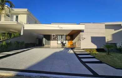 Imagem: A casa em condomínio possui 4 Dormitórios, 5 Banheiros, 5