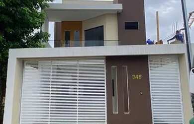 Imagem: A casa possui 3 Dormitórios, 3 Banheiros, 2 Vagas na garagem